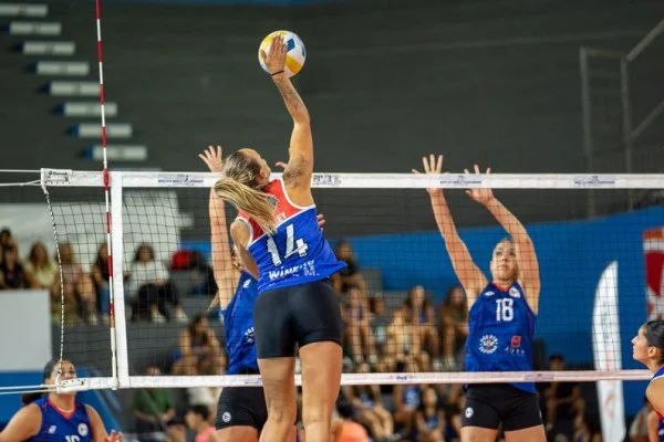 female volleyball player spiking