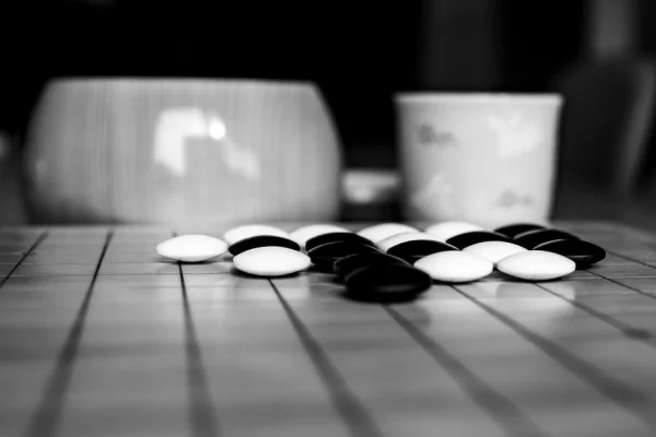 black and white Go stones